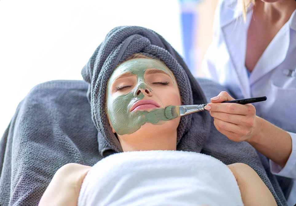 Close-up of organic skincare ingredients like aloe vera and honey, essential for winter facials