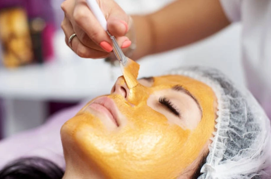 Facial mask application for summer skin reset at NY Brows